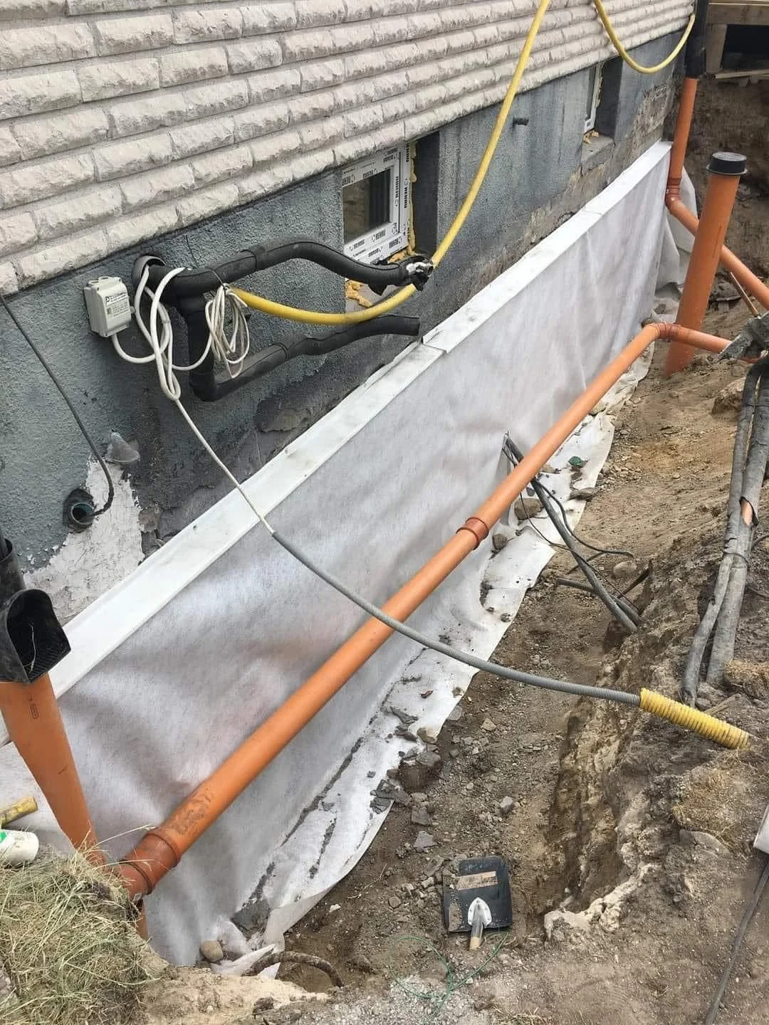 Dräneringsarbete och markplanering - fuktskydd villa